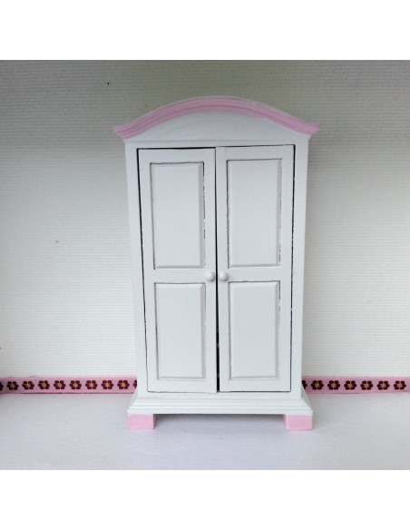 Armario ropero blanco con filo rosa