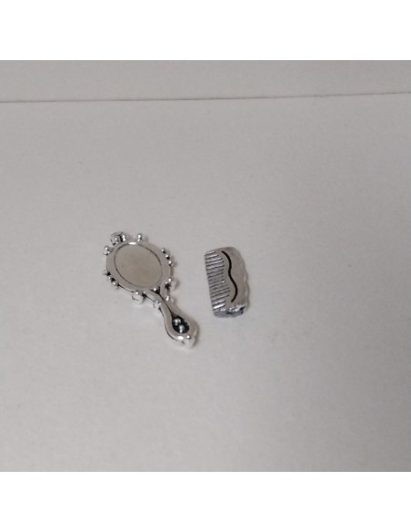 Set de peine y espejo plateados