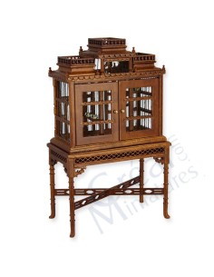 Jaula con mesa de colección