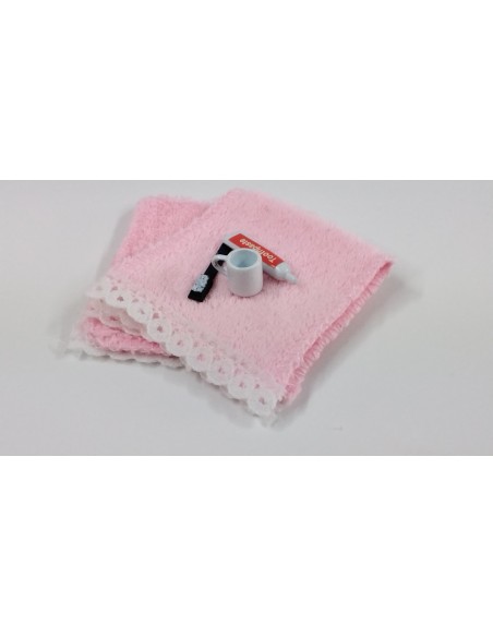 Toalla celeste y set cepillo de dientes