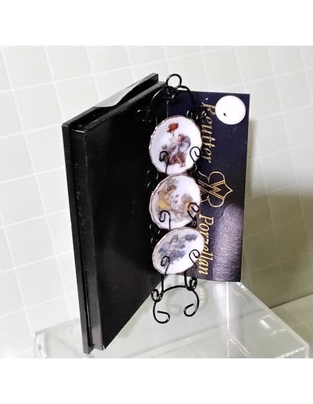 Platos con soporte para colgar de la marca Reutter