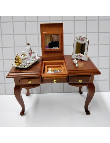 Tocador con complementos de la marca...