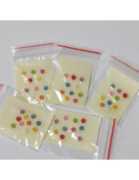Botones de colores surtidos de 4mm 10 unidades.