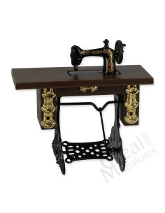 Maquina de coser metal y...