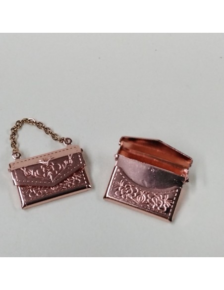 Bolso de metal, color rosa. UNIDAD