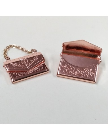 Bolso de metal, color rosa. UNIDAD