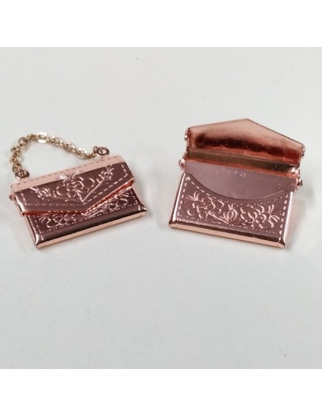 Bolso de metal, color rosa. UNIDAD