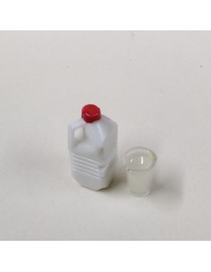 Botella y vaso de leche
