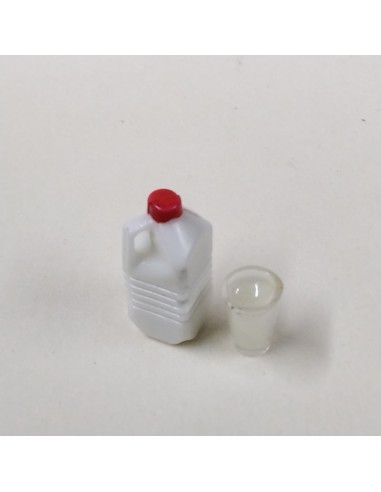 Botella y vaso de leche