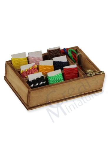 Caja con accesorios de costura