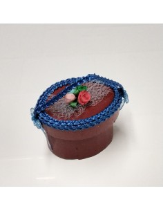 Sombrerera adornada en azulina