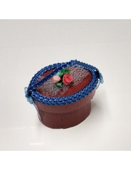 Sombrerera adornada en azulina