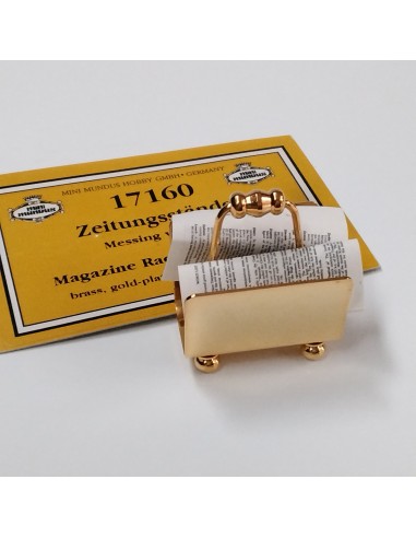 Revistero dorado de la marca alemana...