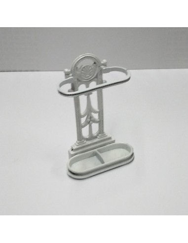 Paragüero o bastonero de metal negro...