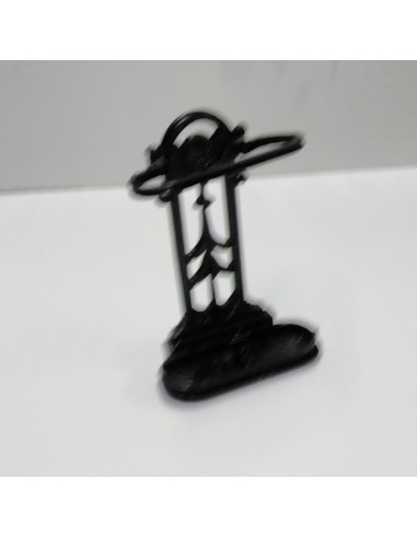 Paragüero o bastonero de metal negro...