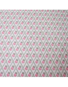 Papel amarillo y flores rosa