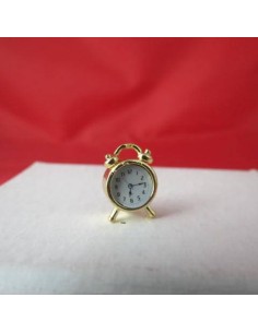 Reloj despertador dorado