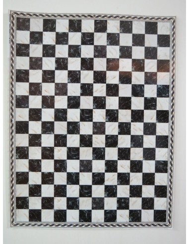 Papel mármol damero.