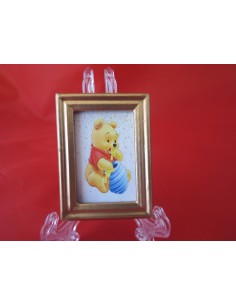 Winnie comiendo miel