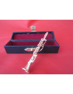 Clarinete dorado más estuche