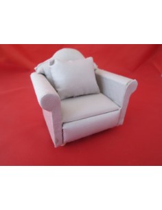 Sillón tapizado en gris