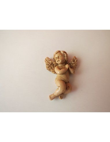 Figura de angel en arcilla